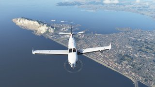 Nice flying over the Rock of Gibraltar, LXGB airfield, and the harbor. Rare ships of Microsoft Flight Sim.